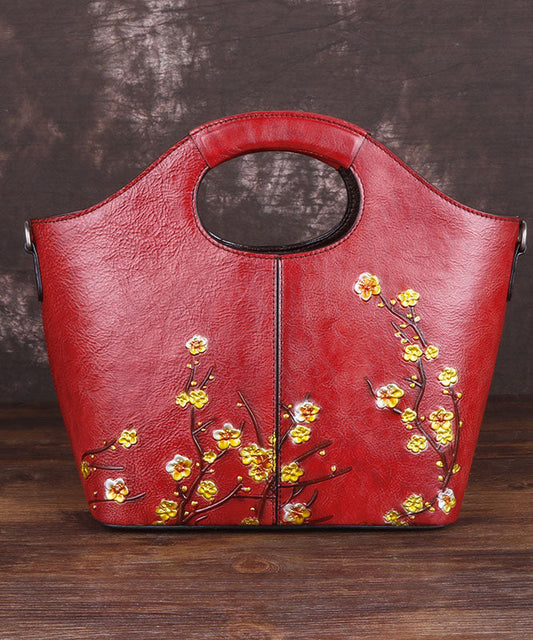 Feine rote Handtasche aus Kalbsleder mit Blumenmuster