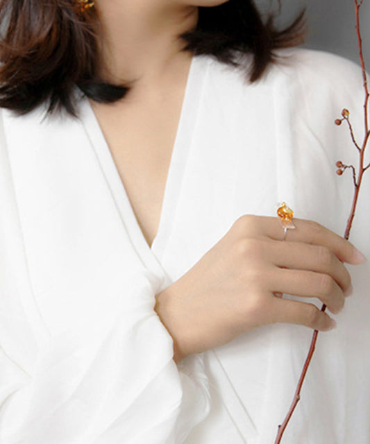 Feine Teekannenringe aus Sterlingsilber mit Bernstein