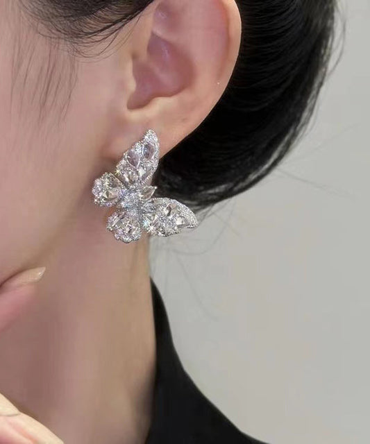 Pendientes de mariposa con circonitas y seda fina en plata de ley