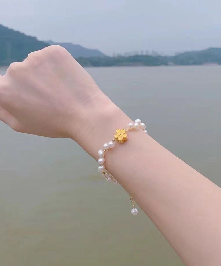 Feines gewebtes Kettenarmband aus 14 Karat Weißgold mit Perlen