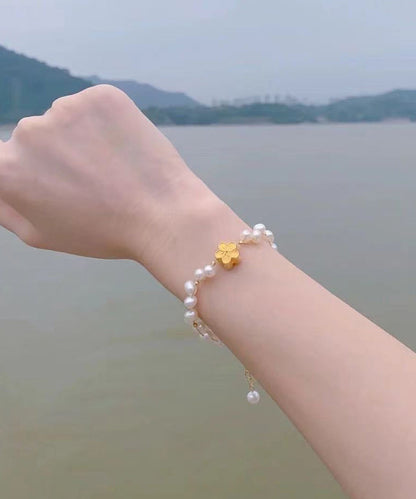 Feines gewebtes Kettenarmband aus 14 Karat Weißgold mit Perlen