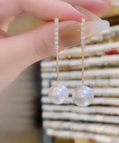 Pendientes de borla con perla y circonitas doradas en plata fina blanca fina