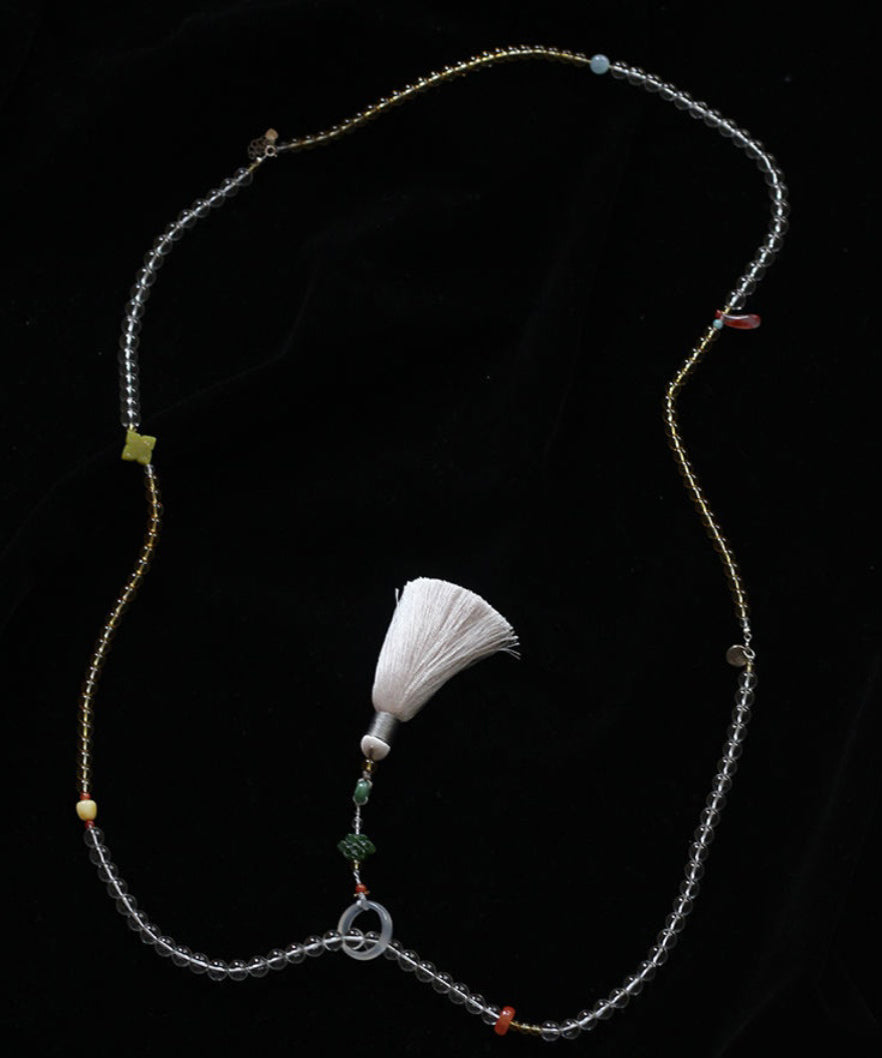 Feine gelbe Patchwork-Halskette mit handgewebtem Kristallperlen-Quastenanhänger