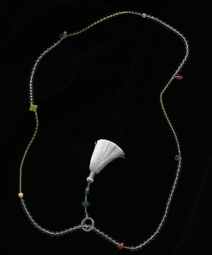 Feine gelbe Patchwork-Halskette mit handgewebtem Kristallperlen-Quastenanhänger