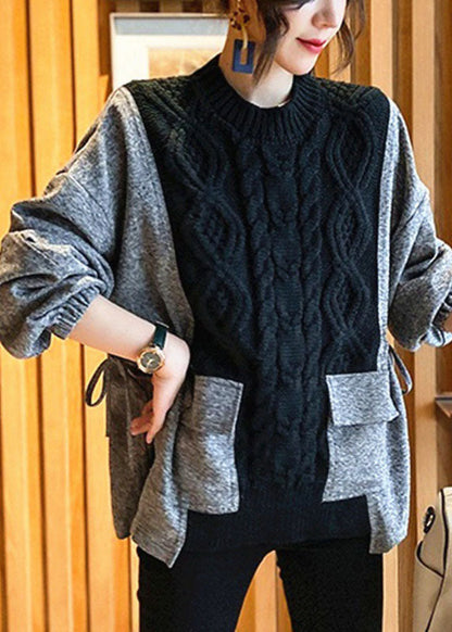 Figurbetonter schwarzer Patchwork-Pullover mit Rundhalsausschnitt und lockerem Herbstmuster