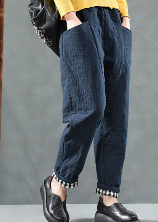 Taillierte schwarze Hosen mit Taschen und feiner Baumwollfüllung für den Winter