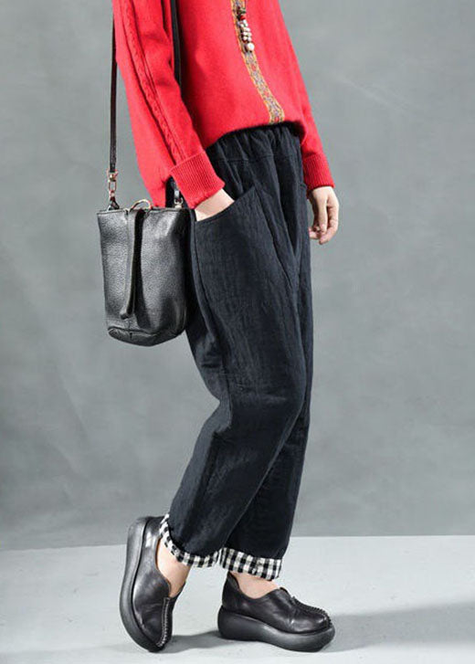 Taillierte schwarze Hosen mit Taschen und feiner Baumwollfüllung für den Winter