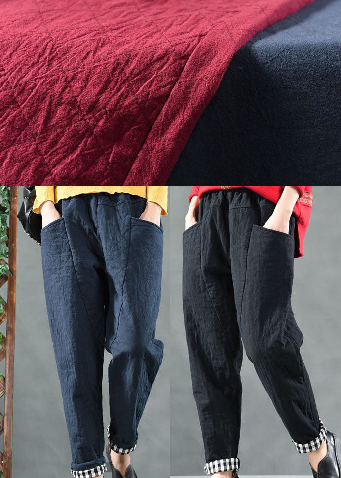 Taillierte schwarze Hosen mit Taschen und feiner Baumwollfüllung für den Winter