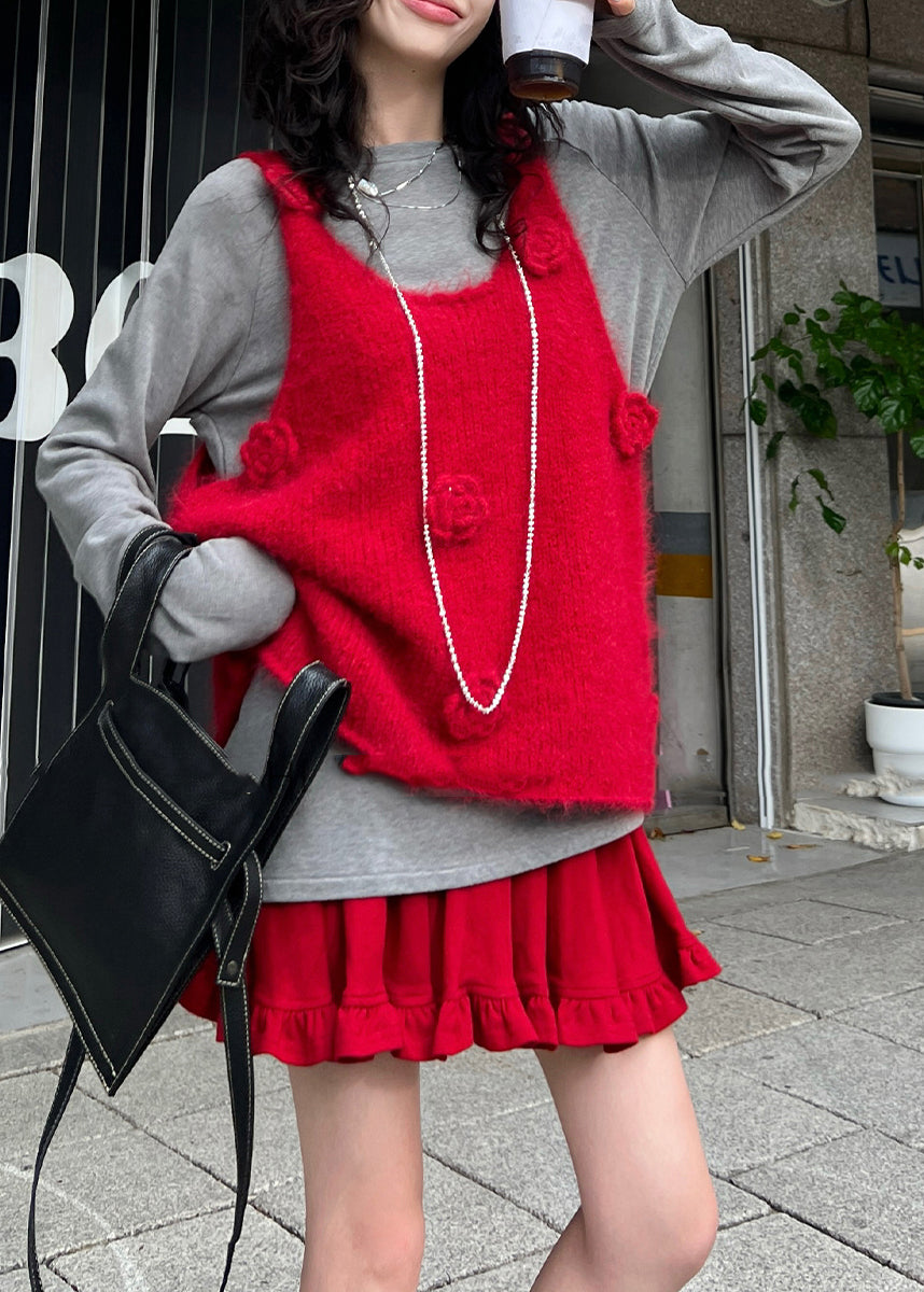 Taillierte rote Strickwesten mit Blumenmuster für den Winter