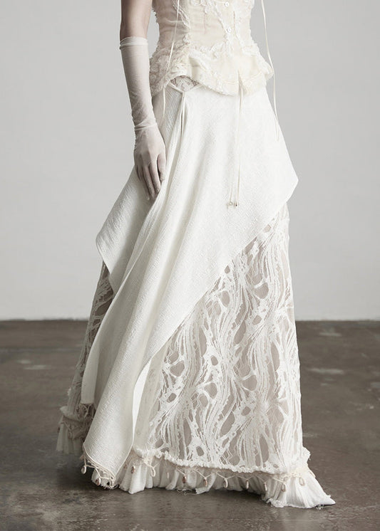 Faldas ajustadas de encaje con borlas blancas y patchwork para primavera