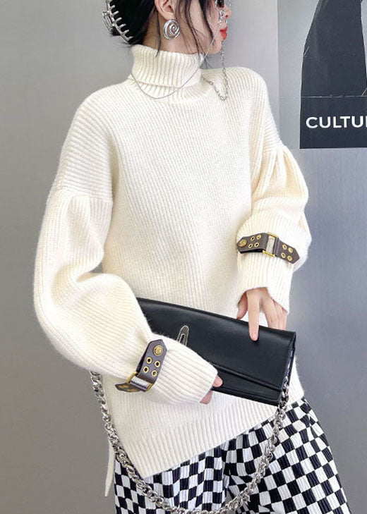 French Apricot Rollkragenpullover mit niedrigem und hohem Design, lockerer Herbst-Strickpullover