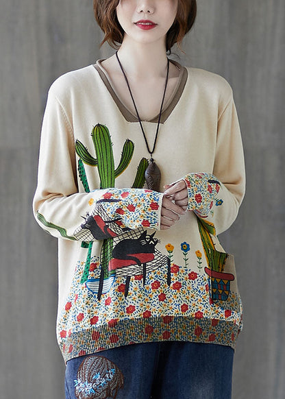 Französischer beigefarbener V-Ausschnitt-Pullover mit lockerem Print für den Herbst
