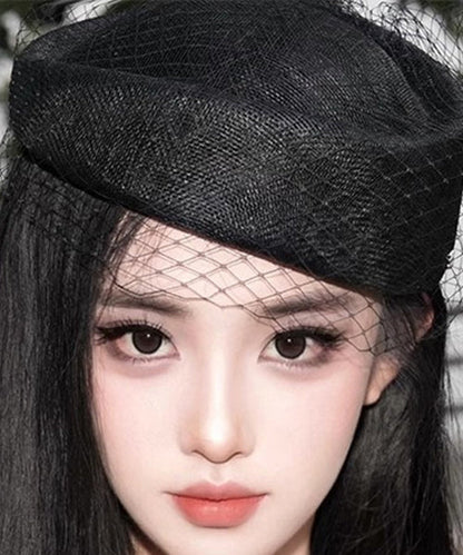 Sombrero cloche francés de malla negra con patchwork