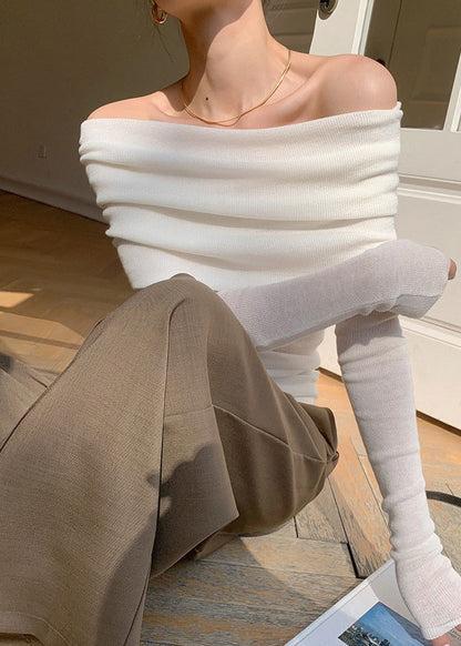 Suéter corto de punto con hombros descubiertos de color rosa francés para primavera