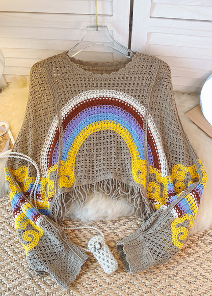 Suéter de punto con estampado de arcoíris ahuecado y borlas azules y blancas francesas de otoño