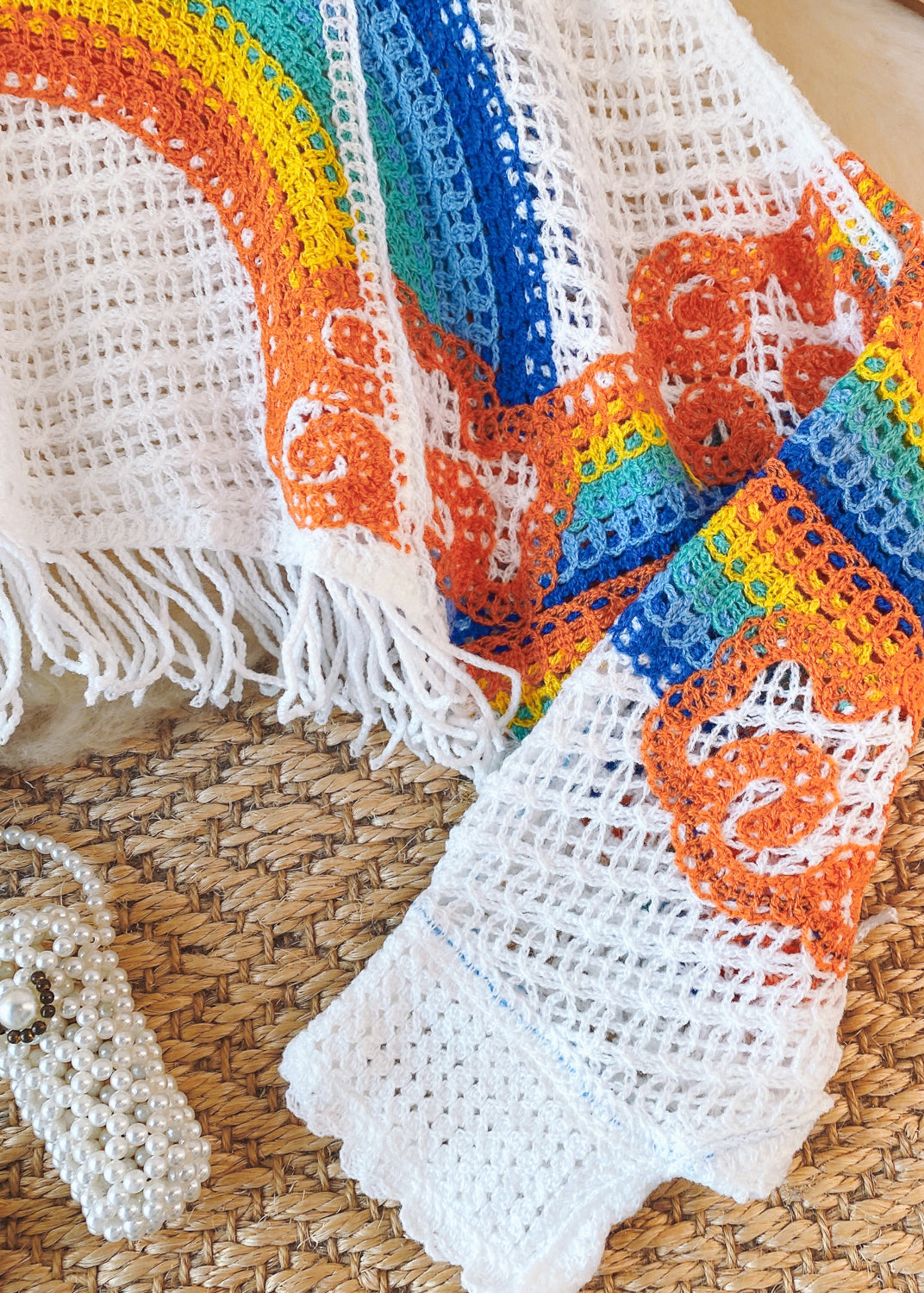 Suéter de punto con estampado de arcoíris ahuecado y borlas azules y blancas francesas de otoño