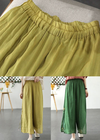 Pantalones anchos de lino con patchwork verde y cintura elástica con abertura lateral para verano