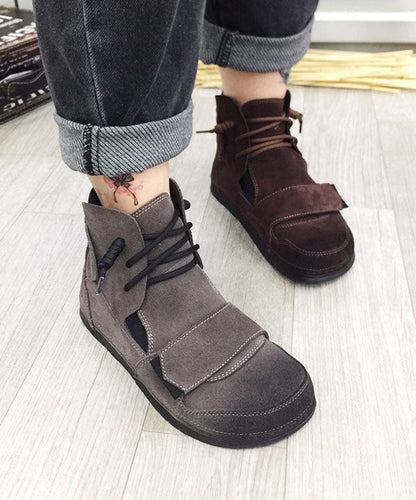 Graue Stiefel aus Rindsleder mit gekreuzten Riemen