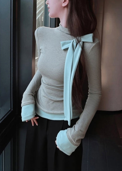 Graue T-Shirts aus Baumwolle mit Schleifen-Patchwork, schmale Passform, Frühling