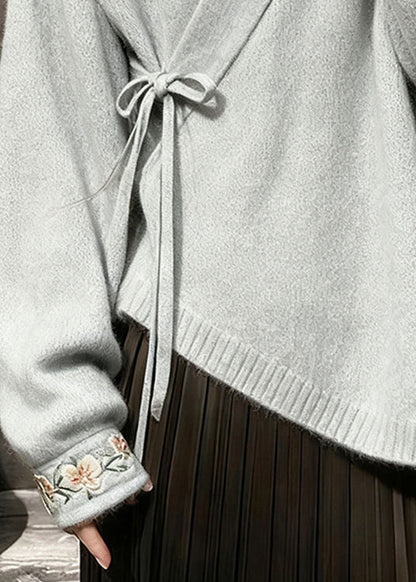 Suéteres de punto con cordones y flores grises, cuello en V, primavera