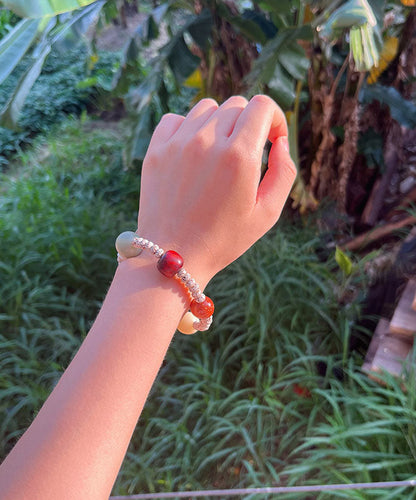 Handgefertigtes Perlenarmband mit Bodhi-Ratte und Quaste