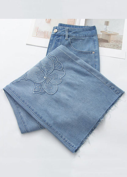 Handgefertigte blaue, mit Zirkonia bestickte Jeans für den Frühling