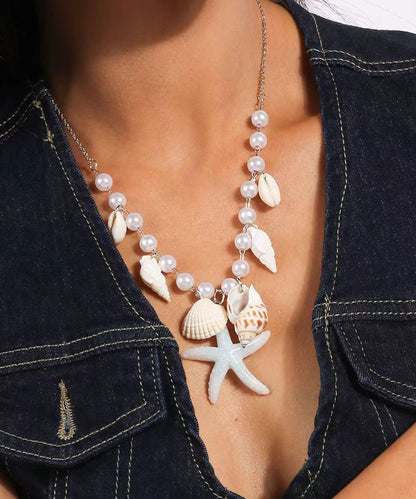 Handgemachte Halskette mit Seestern-Anhänger aus blauem Edelstahl mit Perlenmuscheln