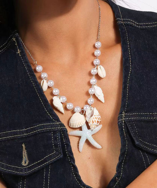 Handgemachte Halskette mit Seestern-Anhänger aus blauem Edelstahl mit Perlenmuscheln