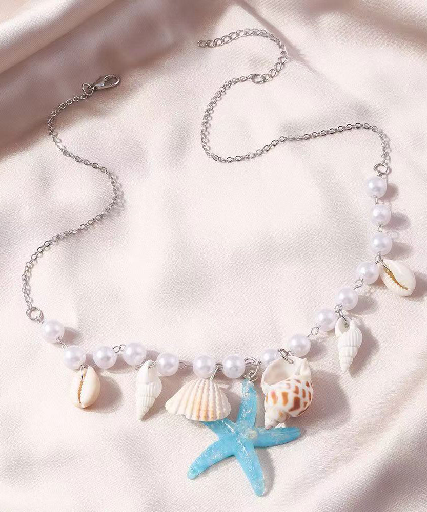 Handgemachte Halskette mit Seestern-Anhänger aus blauem Edelstahl mit Perlenmuscheln