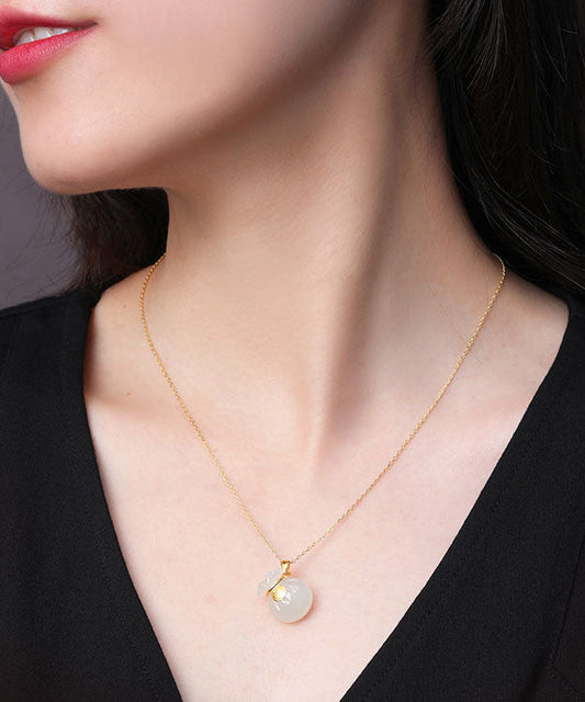 Collar con colgante de bolsa de la suerte de jade con incrustaciones de oro hecho a mano