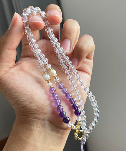 Collar con medallón de perla de cristal de color púrpura degradado hecho a mano