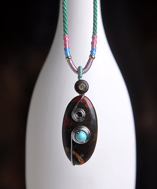 Handgemachte Halskette mit Anhänger aus grünem Kupfer und türkisfarbener Glasur