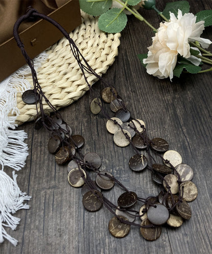 Collar de cuentas con forma de disco pequeño de lino y algodón verde hecho a mano