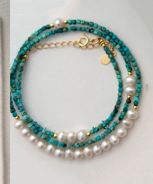 Handgemachte grüne Patchwork-Halskette aus Sterlingsilber mit überzogener türkisfarbener Perle und abgestuften Perlen