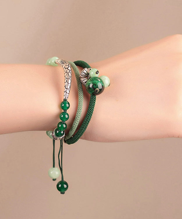 Handgefertigtes Charm-Armband aus grünem Sterlingsilber mit Jade-Achat und Katzenauge