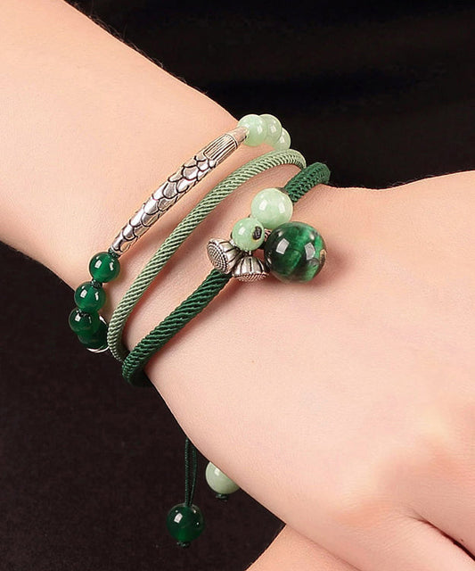 Handgefertigtes Charm-Armband aus grünem Sterlingsilber mit Jade-Achat und Katzenauge