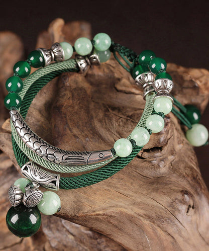 Handgefertigtes Charm-Armband aus grünem Sterlingsilber mit Jade-Achat und Katzenauge