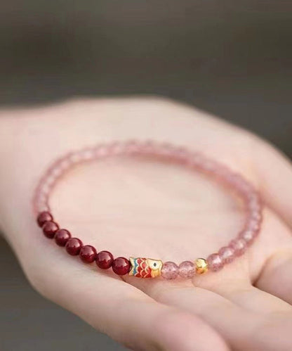 Handgefertigtes Cinnaba-Armband mit eingelegtem Kristall