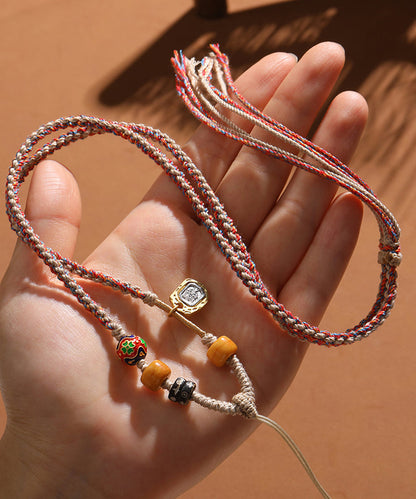 Collar de lazo con borlas y cuentas de barril de cloisonné caqui hecho a mano