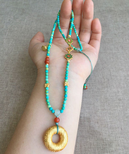 Collar con colgante de borla floral de jade turquesa verde claro hecho a mano