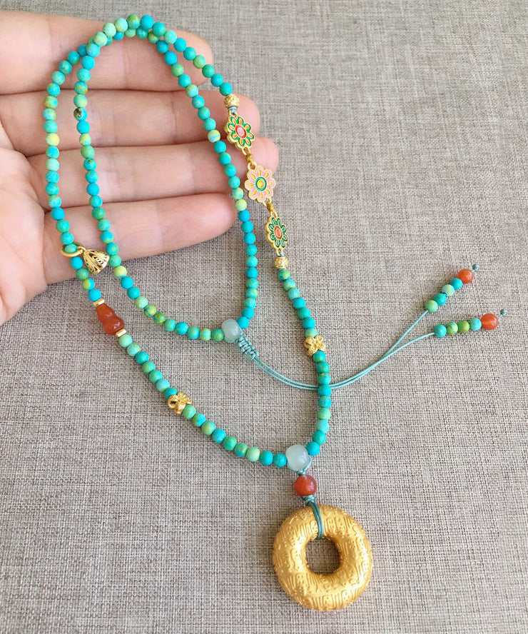 Collar con colgante de borla floral de jade turquesa verde claro hecho a mano