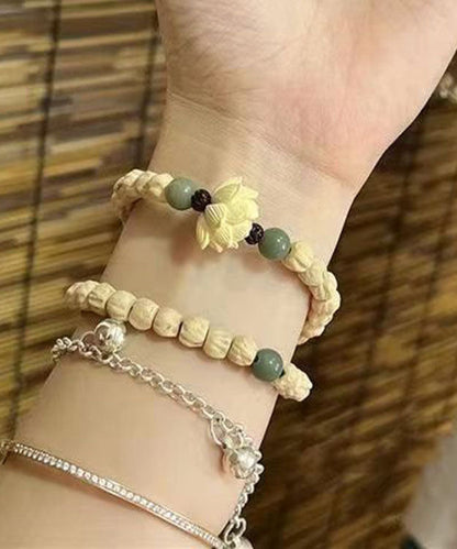 Pulsera hecha a mano con cuentas de Buda de loto amarillo claro