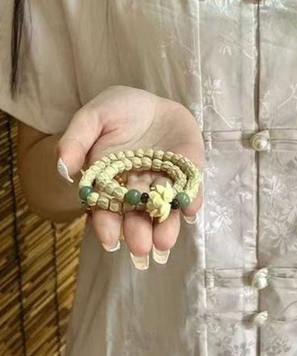 Pulsera hecha a mano con cuentas de Buda de loto amarillo claro