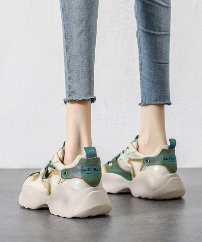 Handgemachte grüne Schnürschuhe aus Rindsleder mit hohem Keilabsatz