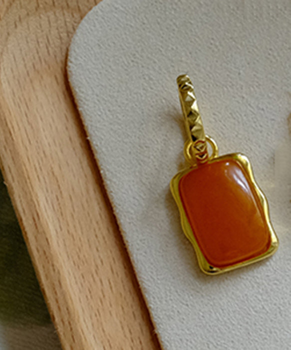 Handgemachte orangefarbene quadratische Creolen aus Sterlingsilber mit Bienenwachsüberzug