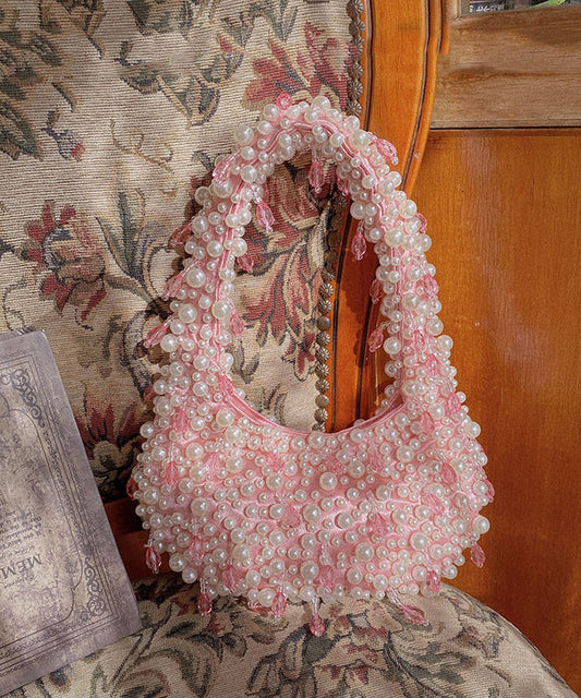 Bolso tote tejido con perlas rosas hecho a mano