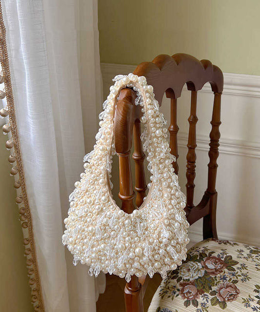 Bolso tote tejido con perlas rosas hecho a mano