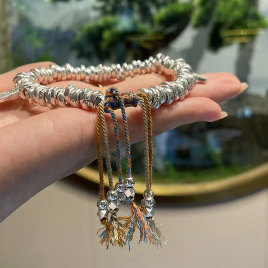 Handgefertigtes Charm-Armband aus Sterlingsilber mit gebrochener Silberquaste