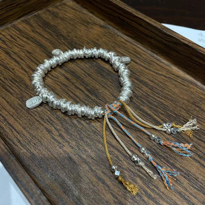 Handgefertigtes Charm-Armband aus Sterlingsilber mit gebrochener Silberquaste