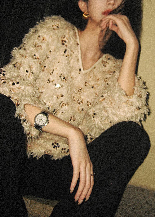 Suéteres de punto con lentejuelas y borlas con cuello en V hechos a mano para invierno